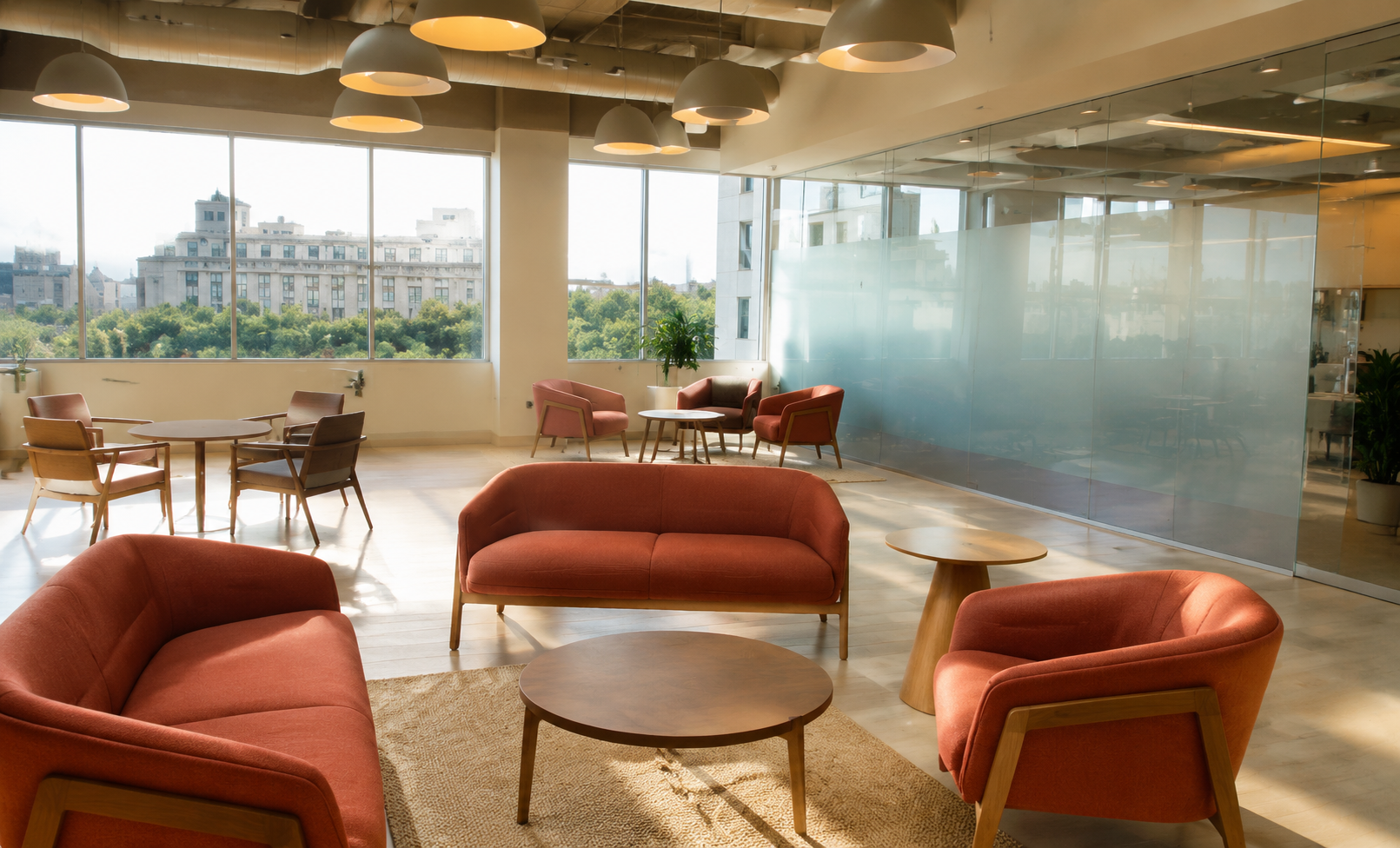 Candidate welcome area with upholstered seating, tables, and bright windows